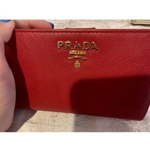 Red Prada Wallet with Gold. Saffiano Leather. Used. Comes with Black Prada Box.